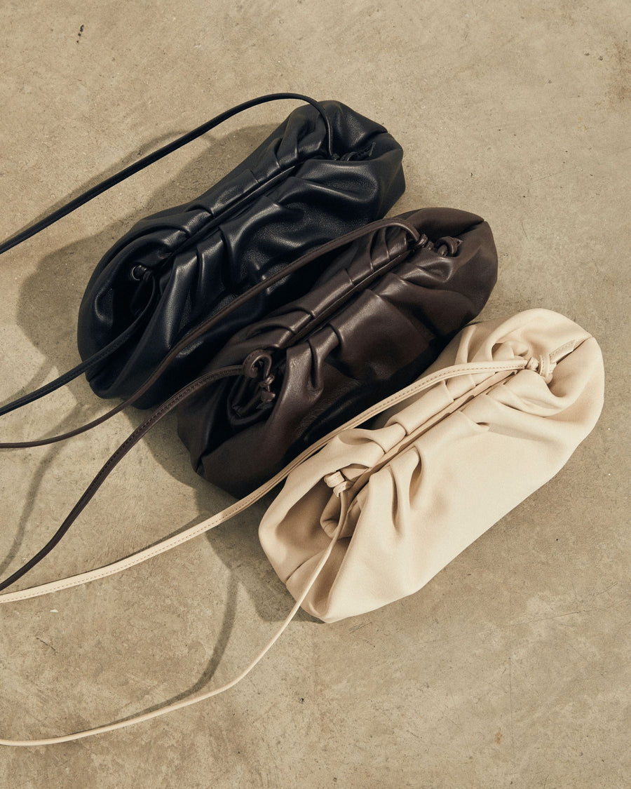 The D Cream Leather Clutch Handbags ALOHAS